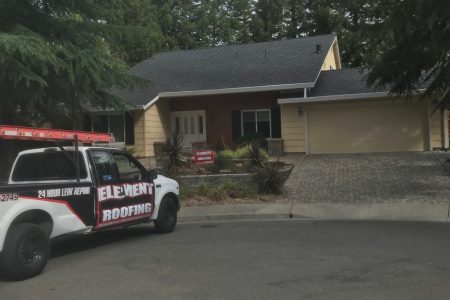 element-roofing-house-004 Element Roofing work truck parked outside a single-story home with a garage in Union City, CA.